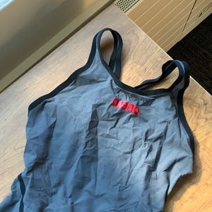 Arena ultra open back knee skin size 28